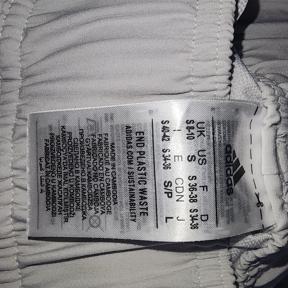 Brand new Adidas shorts with zippered pockets. - Picture 2 of 4